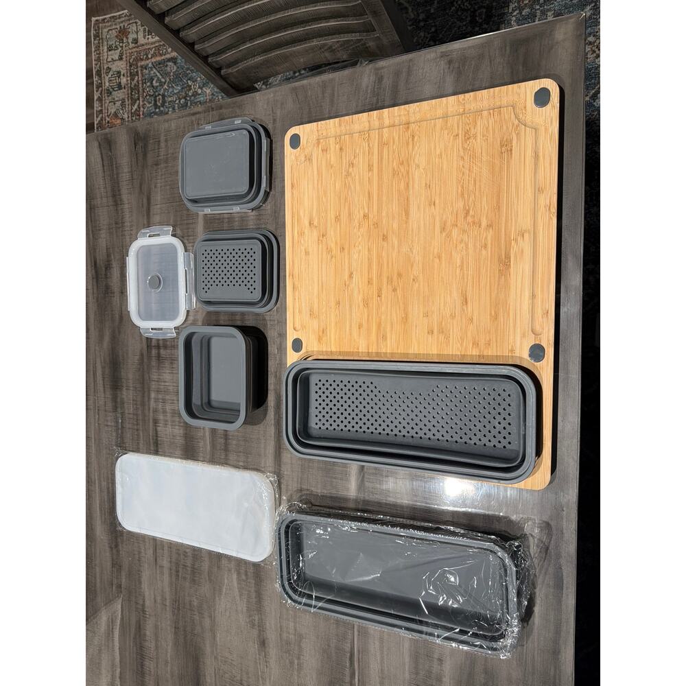 Tidy Board cutting board with scrap and storage accessories